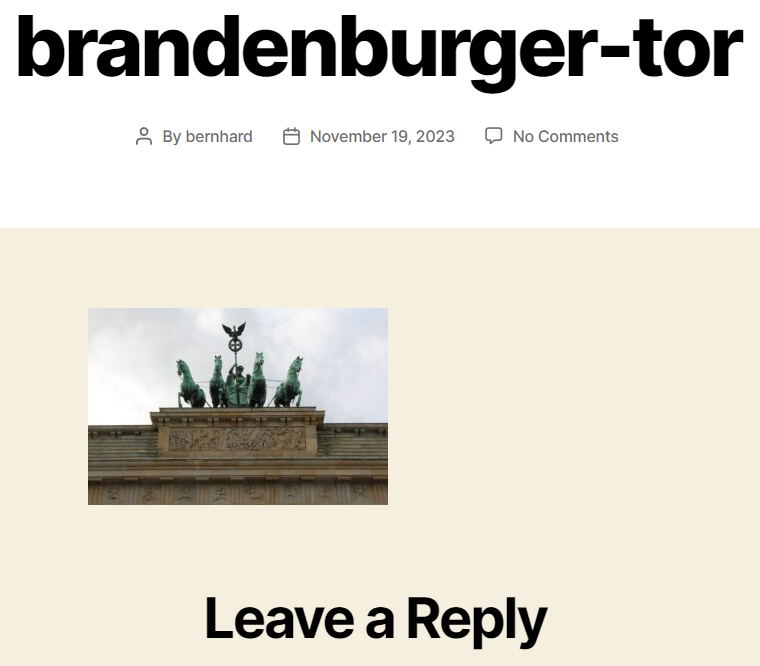 Frontend screenshot showing the title/slug "brandenburger-tor", the post meta information, the image in the content and the beginning of the comment area