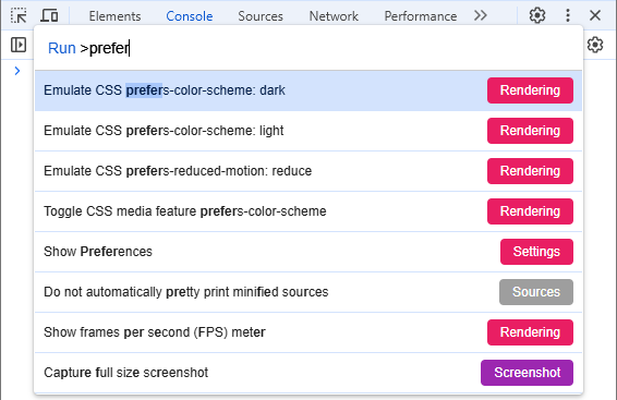 Screenshot of the "Run command" modal with a search for the term "prefer" showing "Emulate CSS prefers-color-scheme: dark" as the first matching command.